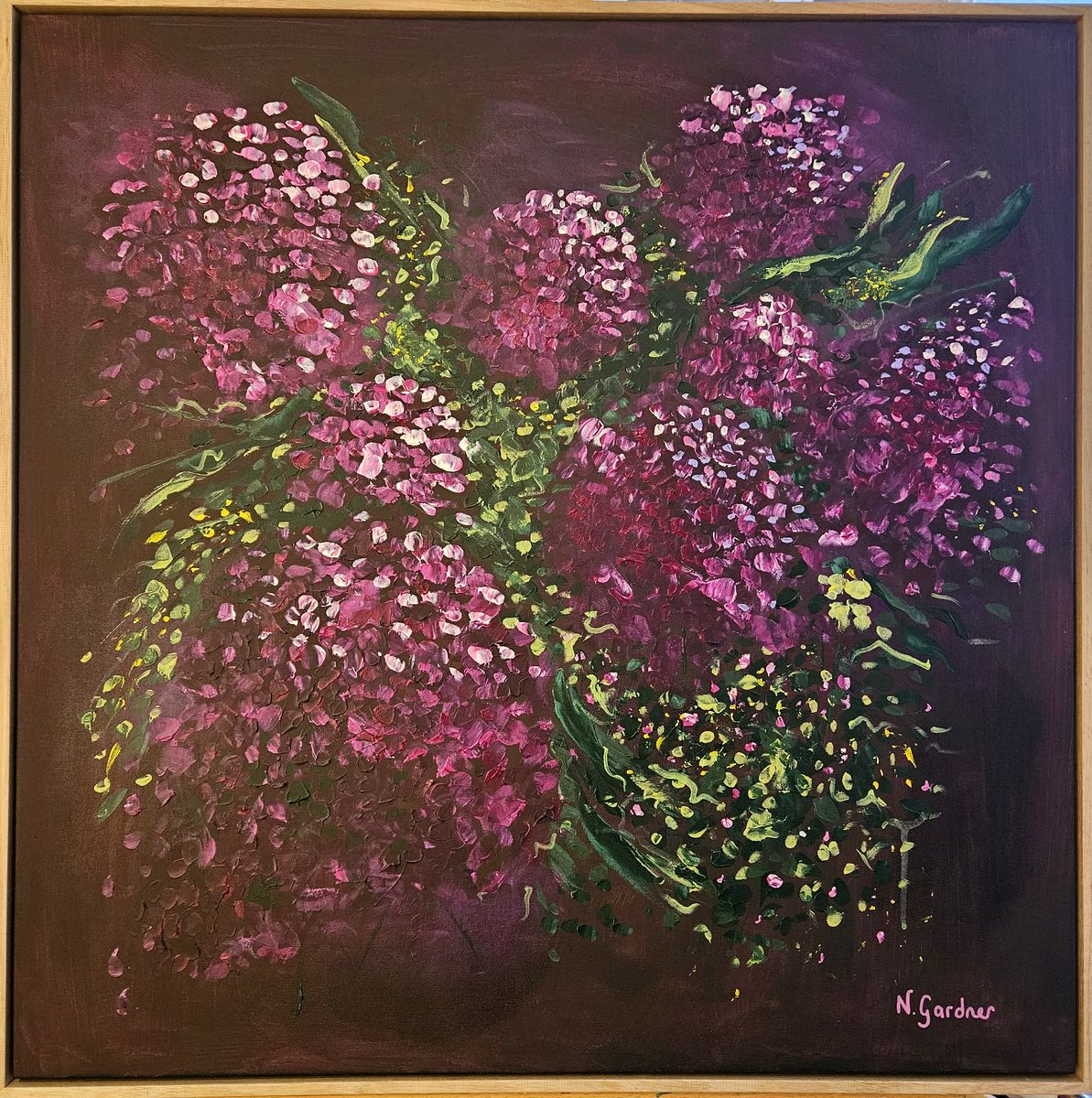 Large original painting of deep pink and magenta hydrangea blooms with green foliage on a rich plum background, framed in oak